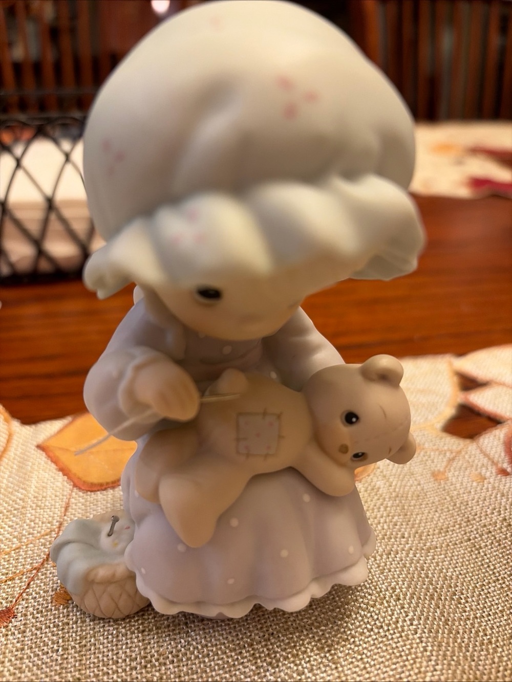 Precious Moments Figurine - Girl Sewing Teddy in Soft Pastel Blue and Cream
